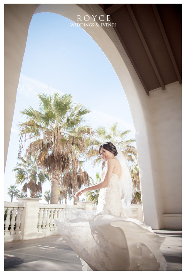 Wedding photography of bride in an elegant wedding gown at the Hyatt Huntington Beach http://RoyceWeddings.com Call: 626-560-2537