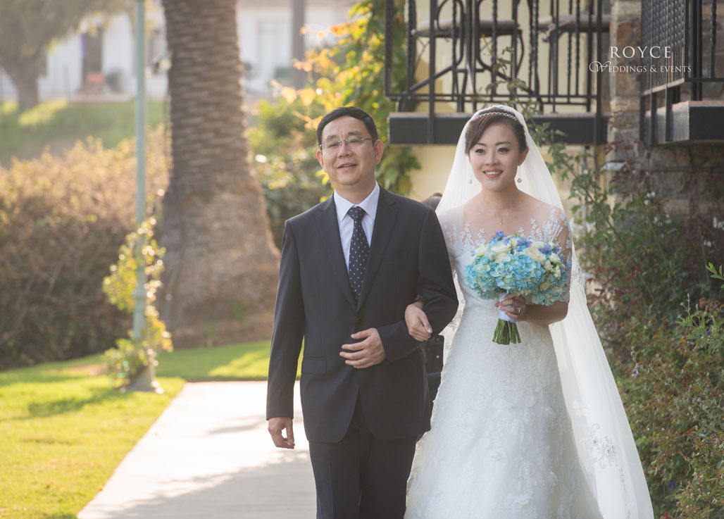 Bride and Father walking looking outside at the Bel Air Bay Club wedding room. http://RoyceWeddings.com Call: 626-560-2537
