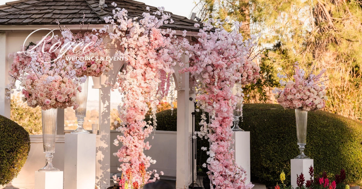 Detailed view of romantic pink ceremony flowers at Los Angeles wedding venue, styled by wedding planner LA.