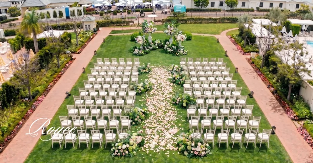 Rosewood Miramar Wedding ceremony on the Great Lawn with elegant floral decor and ocean views