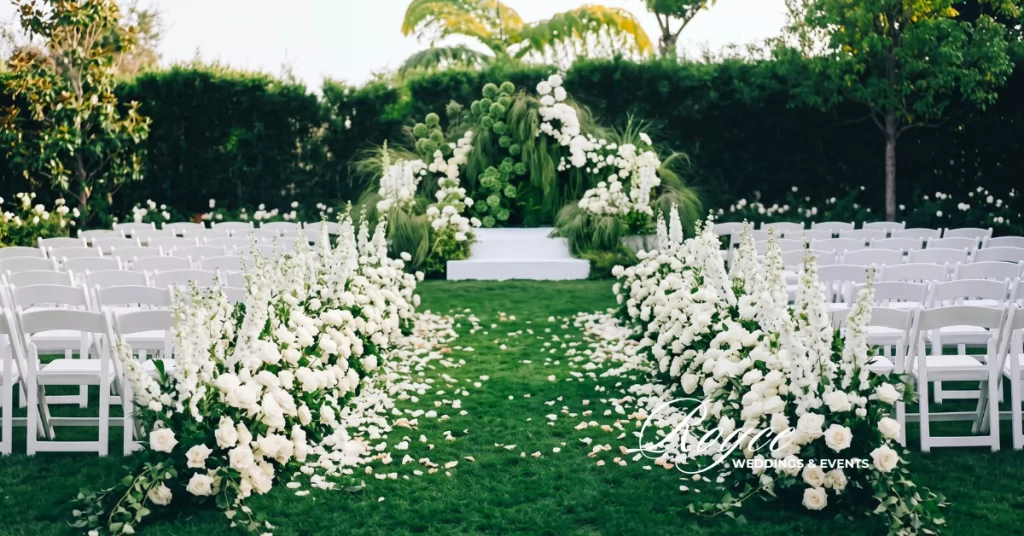 Santa Barbara wedding venue Event Lawn ceremony with elegant floral design and coastal garden setting