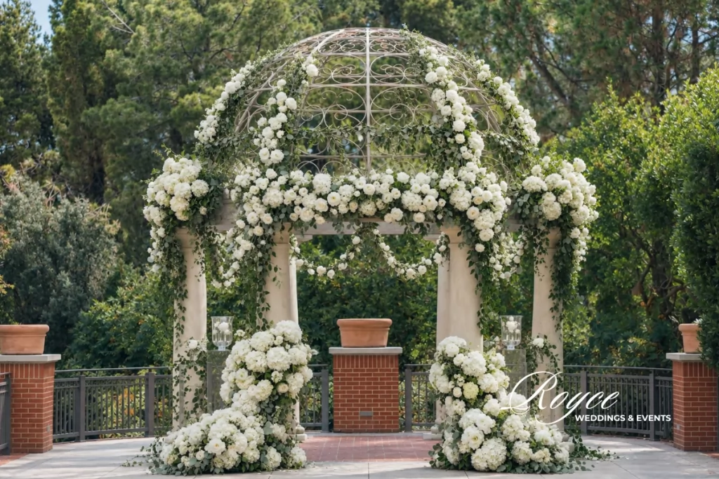Garden wedding ceremony with gazebo and elegant floral decor at Four Seasons Westlake Village