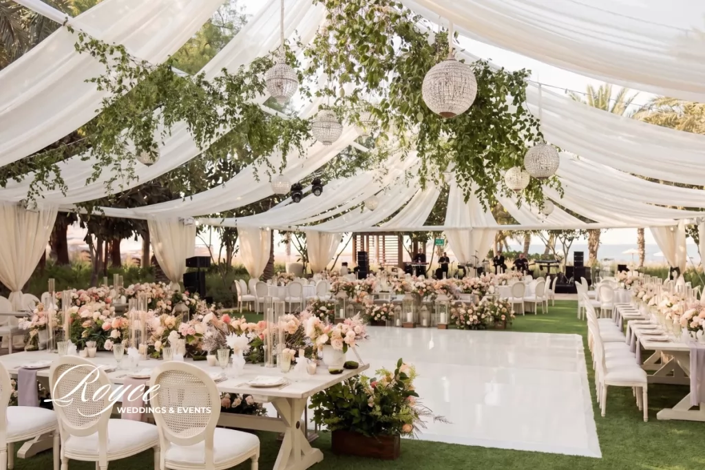 Luxury outdoor wedding reception under an elegant tent at Four Seasons Westlake Village