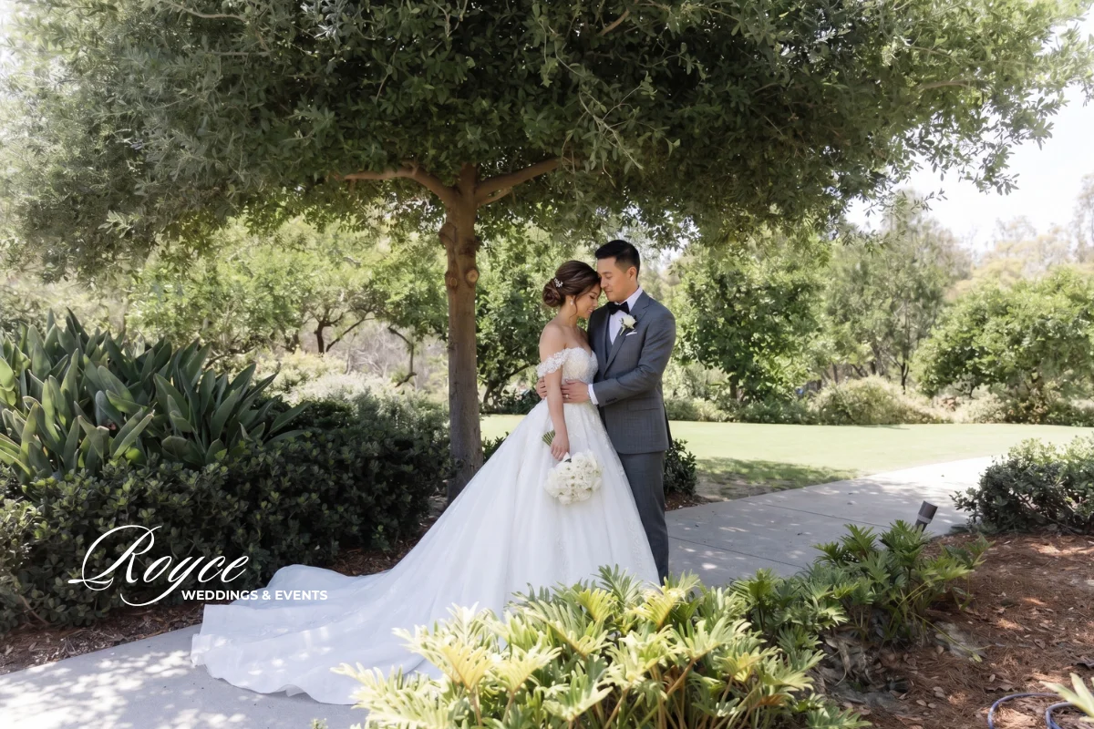 Park Hyatt Aviara Wedding couple portraits outdoors with lush gardens and elegant California scenery