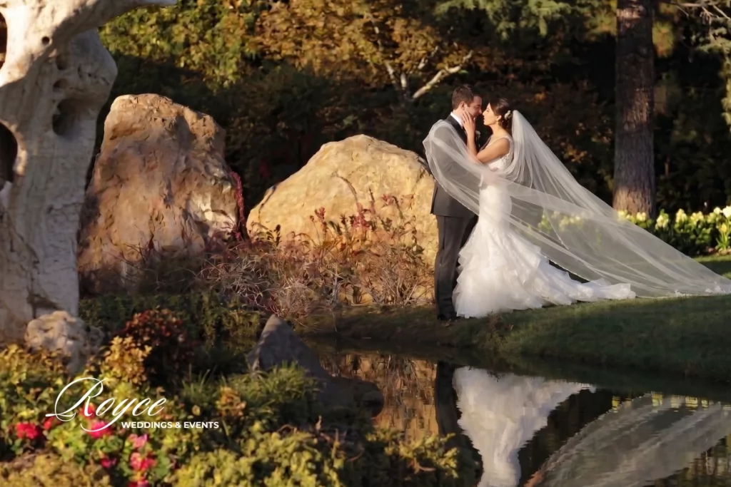 Romantic couple portrait overlooking the waterfront at Four Seasons Westlake Village