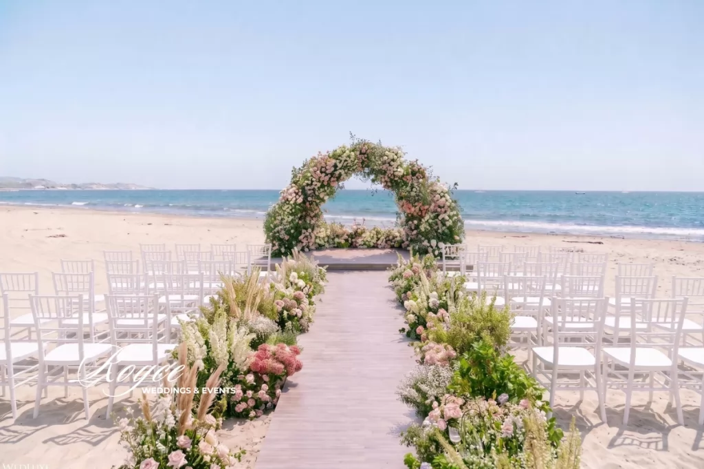 Santa Barbara beach wedding ceremony with oceanfront views and elegant wedding decor