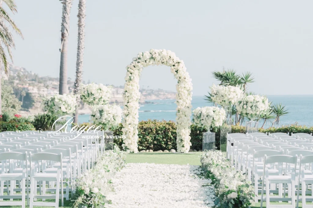 Oceanfront wedding ceremony at Montage Laguna Beach with breathtaking views, planned by Royce Weddings & Events.