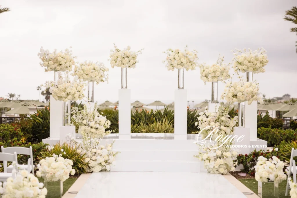Refined wedding ceremony at Waldorf Astoria Monarch Beach, planned by luxury Los Angeles wedding planners.